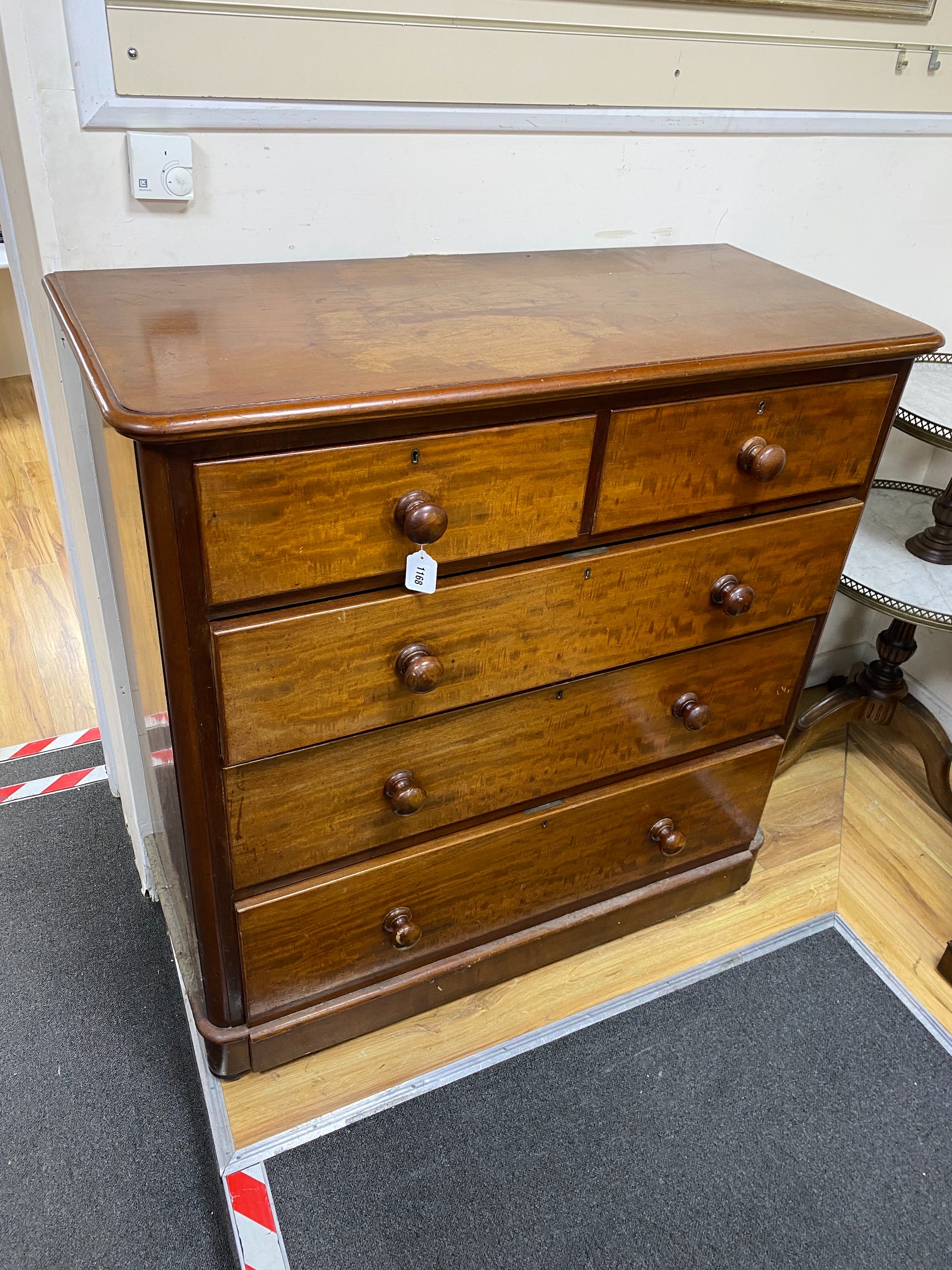 A large late Victorian mahogany chest of two short and three long drawers, width 113cm, depth 51cm, height 112cm